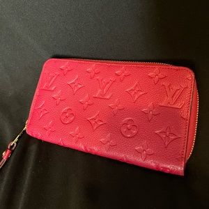 Louis Vuitton zip up red wallet
